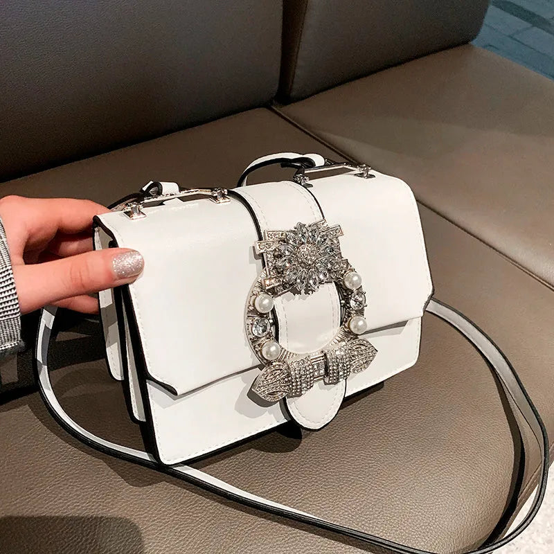 Designer diamond lock shoulder bag for women in quality PU leather, black colour option on display.