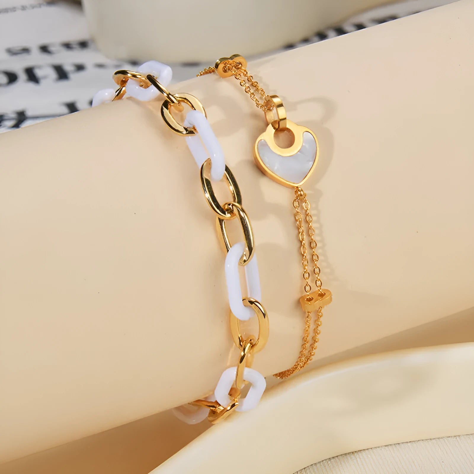 Women's silver stainless steel bracelet with a double-layer red heart charm and magnetic clasp.
