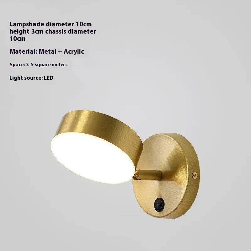 Rotatable bedside wall lamp with golden mirror front in gold finish mounted on wall