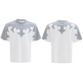 Men's red short sleeve shirt with 3D burnt flower embroidery and rhinestone details on a loose drop shoulder fit.