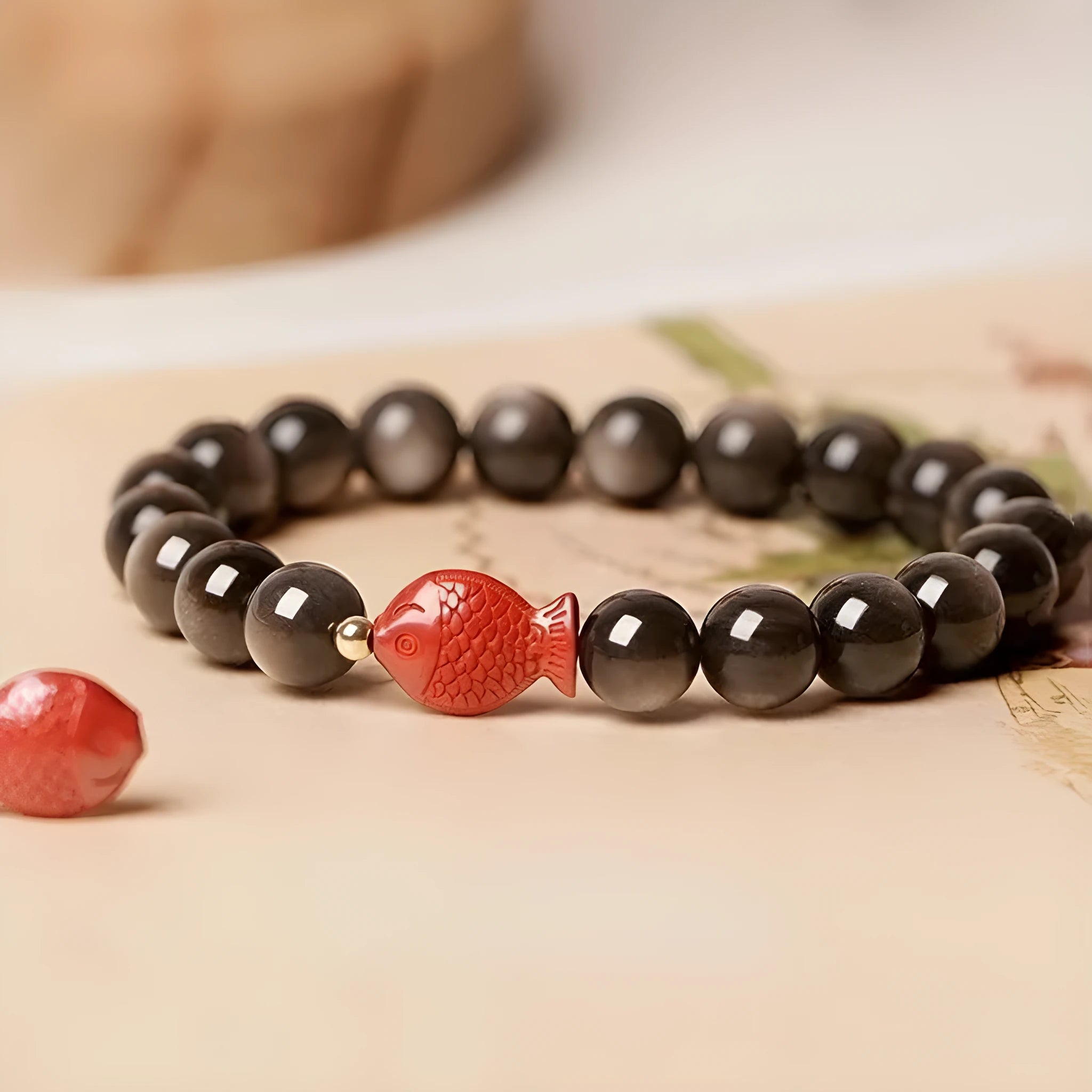 Natural obsidian crystal bracelet with round beads and cinnabar accents in three size options