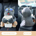 Car tissue box with plush fabric and dog designs hanging from vehicle armrest