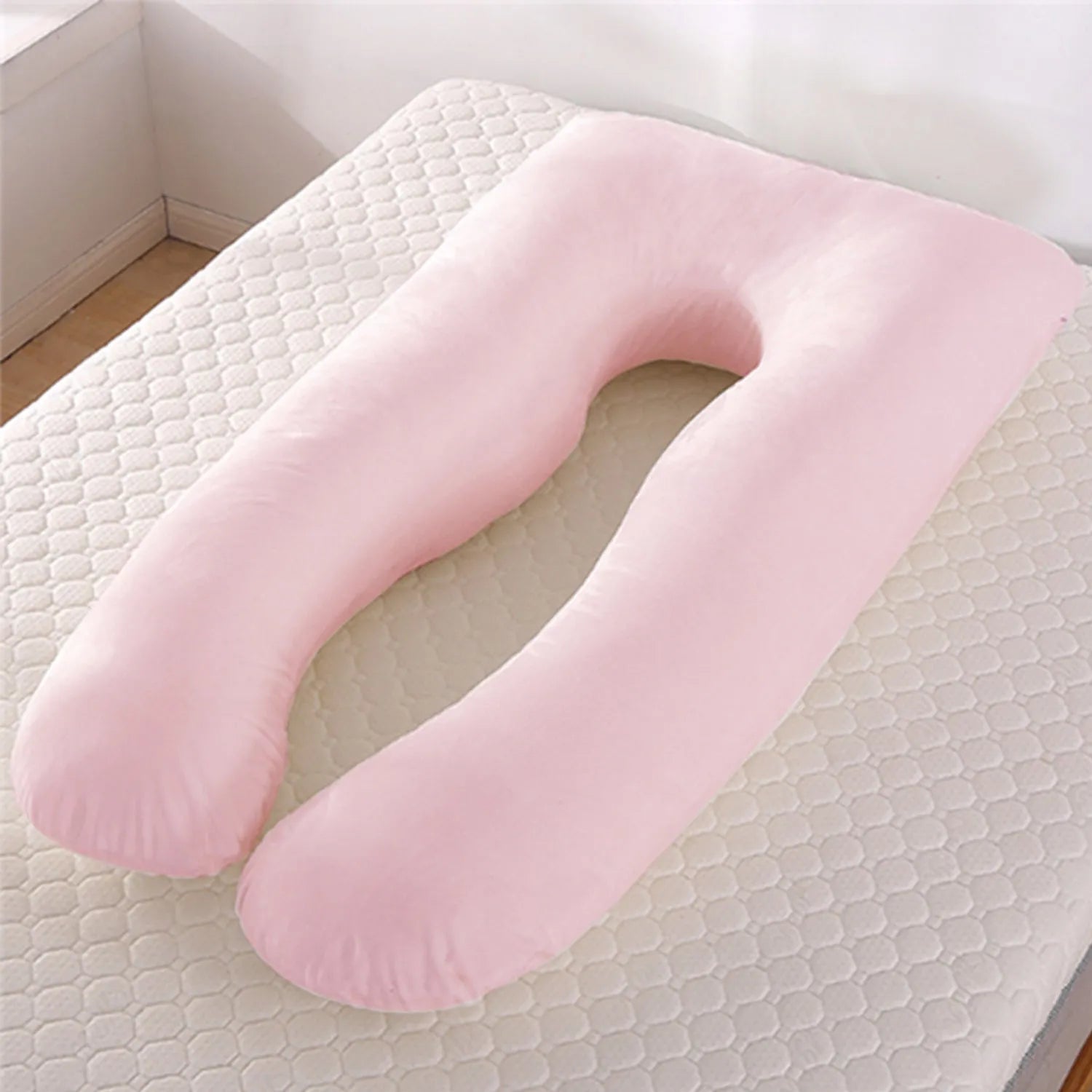 U-shaped maternity pillow with ice silk cover in green colour showing curved design for pregnancy support