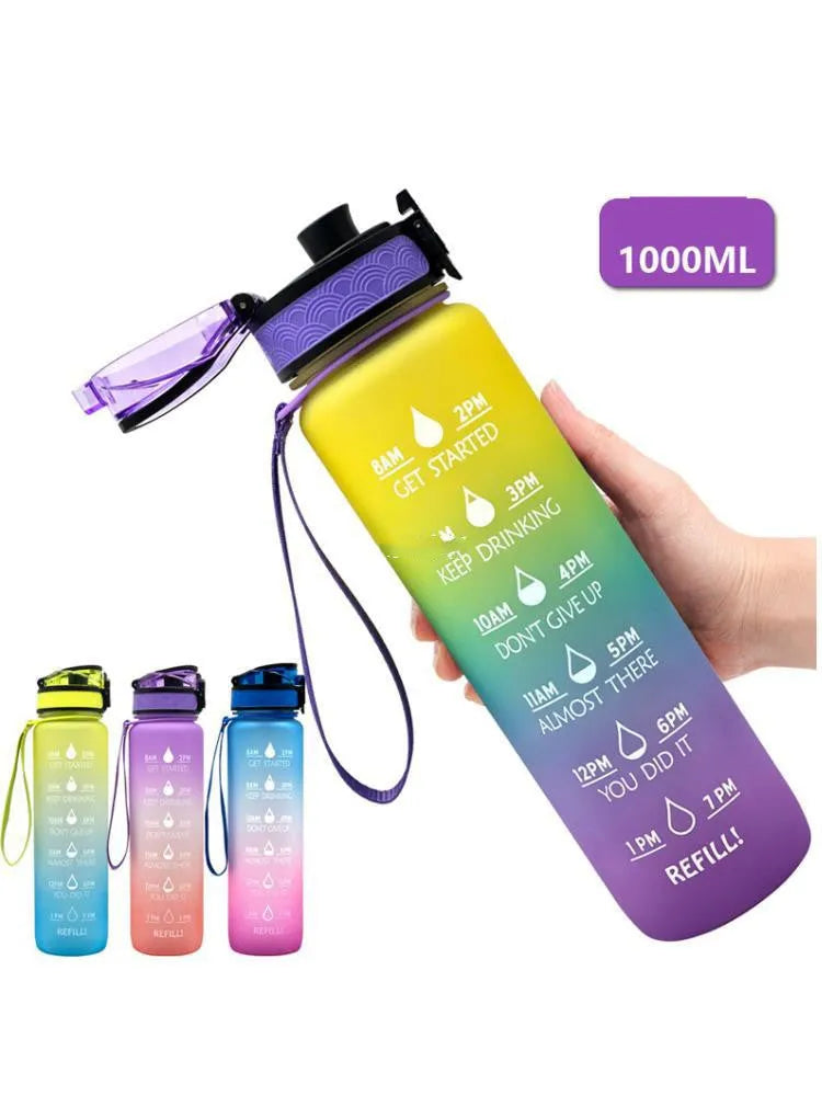 Transparent 1000ml sports water bottle with fruit infuser lid showing BPA-free Tritan plastic construction