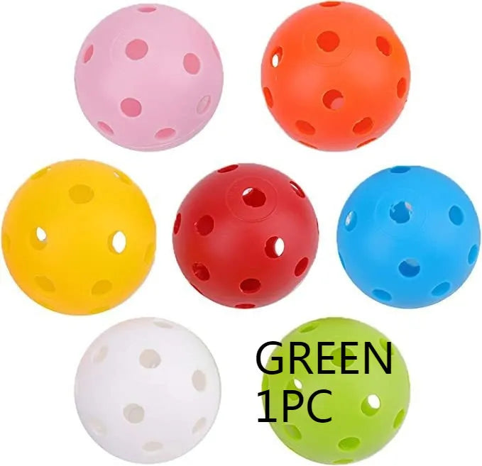 Multi-colour golf practice balls in red, orange, blue, green, white, and yellow shown in a net bag.
