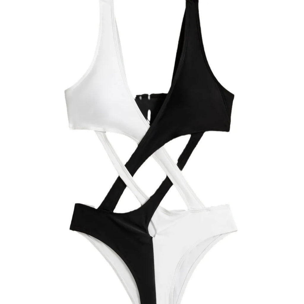 White women's one-piece swimsuit with hollow-out colour block design on nylon fabric