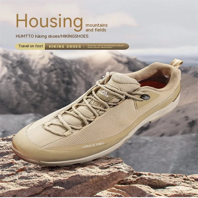 Men's low-top hiking boots with leather mesh upper and non-slip rubber outsole in dark gray colour