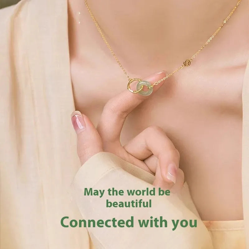 Sterling silver bamboo buckle necklace on geometric O-ring chain, showing adjustable length and pearl detail.