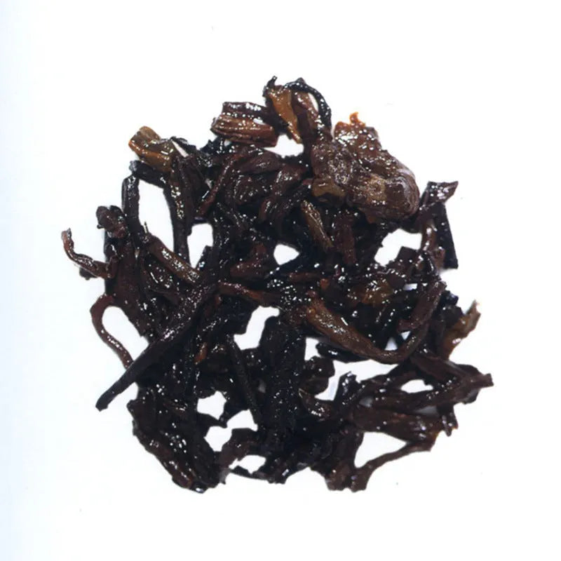 Pu'er Tea Da Yi Cake Tea wrapped in regular tissue paper packaging