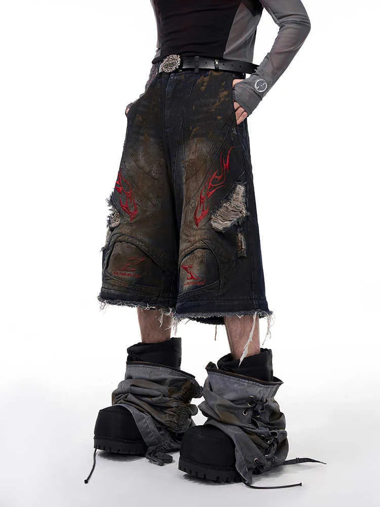 Men's retro jeans with detachable trouser legs showing wide leg denim design