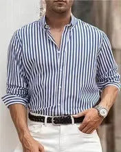 Man modelling a loose-fit khaki striped long sleeve casual button shirt.