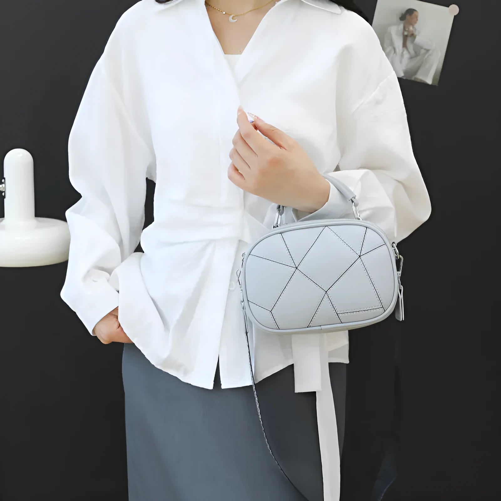 Round grey retro patchwork PU leather crossbody bag with stitching details