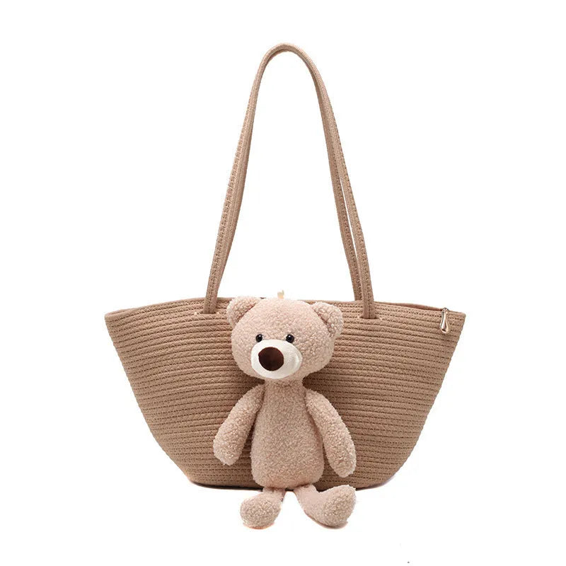 Large woven shoulder bag in cotton and linen fabric with double straps and three-dimensional pockets