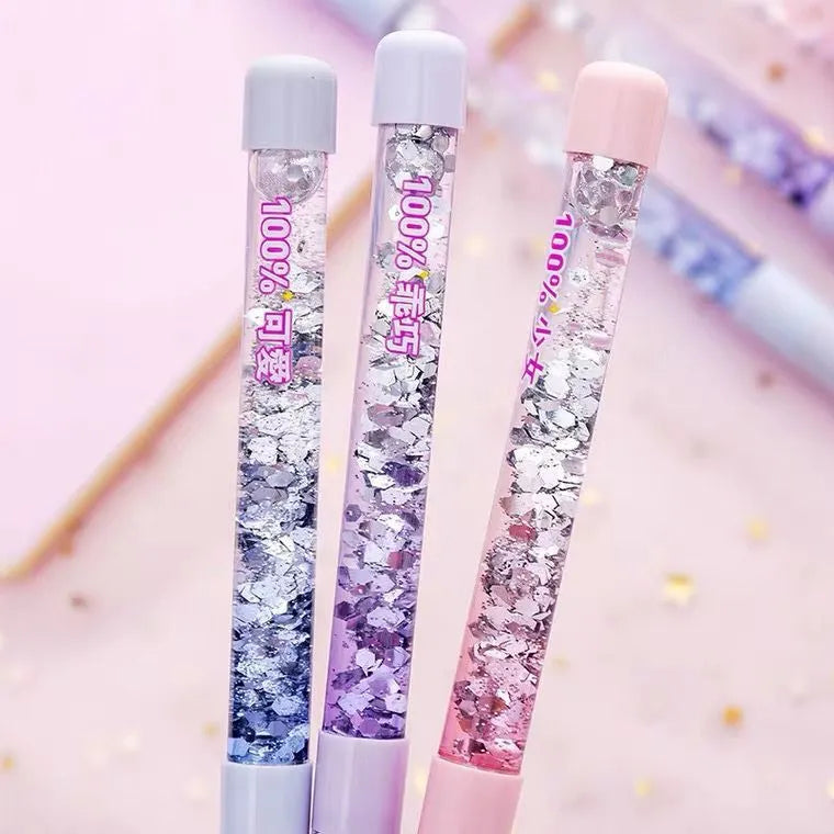Luminous glitter quicksand neutral pen with 0.5mm fine tip in fairy wand blue colour showing flowing glitter inside clear plastic barrel