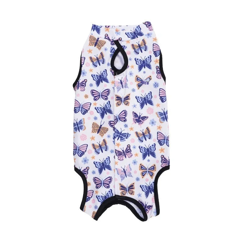 Cat wearing a printed polyester recovery suit with Velcro closures after sterilisation surgery.