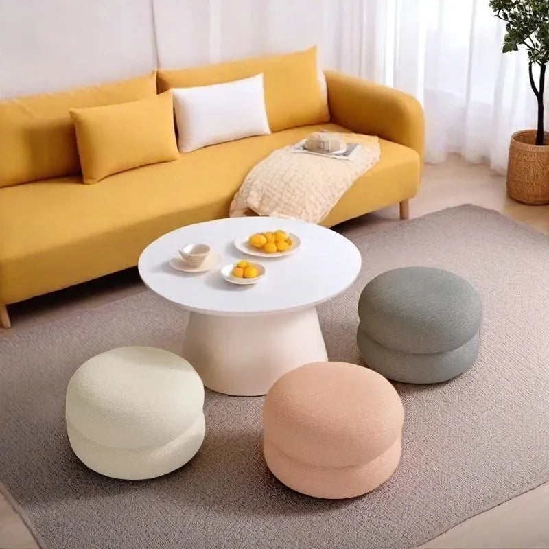 Small round stool with cream-style finish in white colour featuring three layers of lamb high elastic sponge for household use