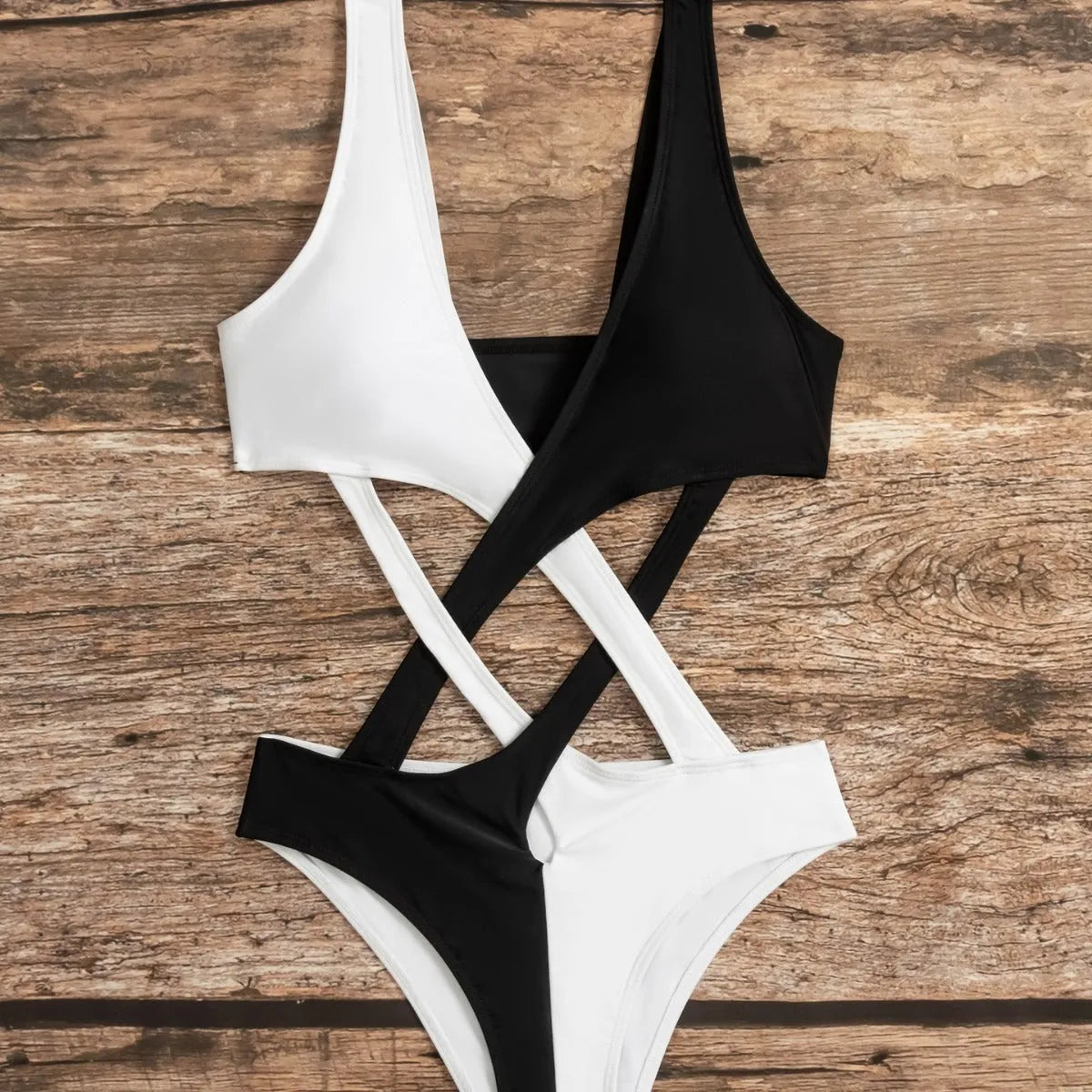 White women's one-piece swimsuit with hollow-out colour block design on nylon fabric