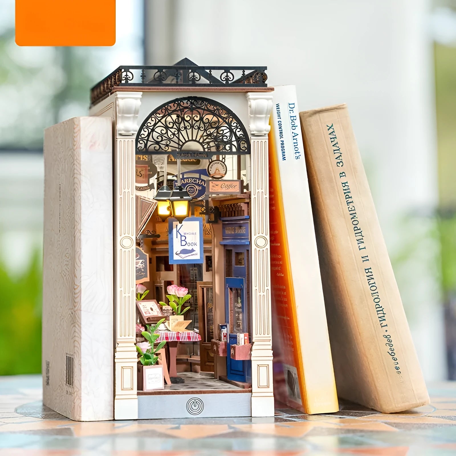 Ruolai Arcade three-dimensional puzzle blocks assembled model showing arcade design on a wooden surface