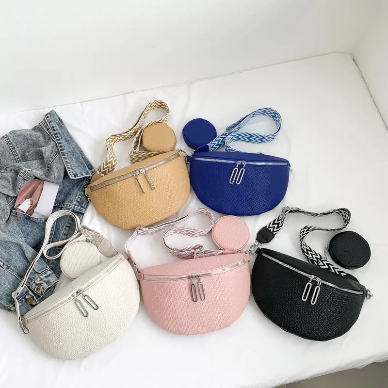 Women's PU leather crossbody bag with clamshell opening in solid colour with zipper texture details