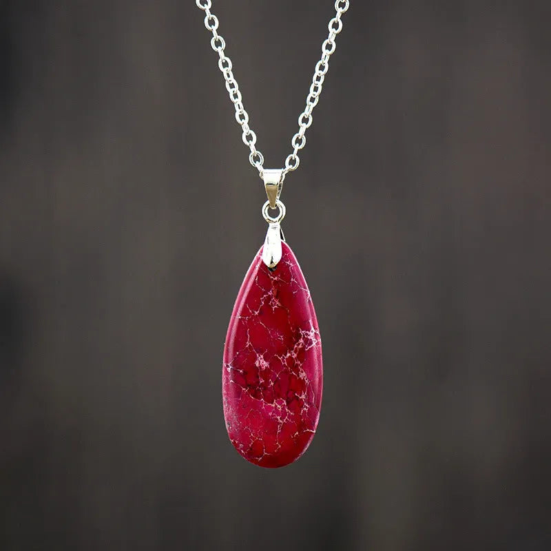 Genuine jade water drop pendant necklace with 18K gold plating in four colour options on a metal chain.
