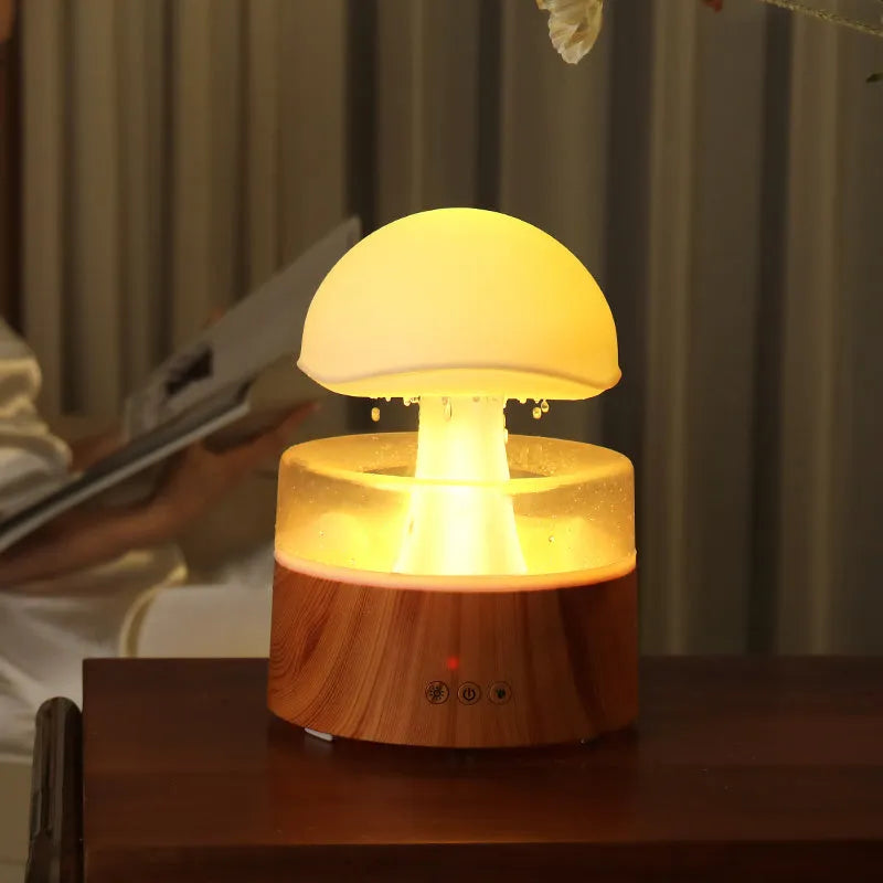 White cloud-shaped ultrasonic humidifier with rainfall mist effect and multi-colour LED lighting