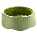 Blue detachable slow feeder bowl for small dogs on a white surface