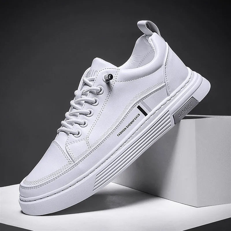 Men's white and black low-top skateboard shoes with an elastic band closure and round toe.