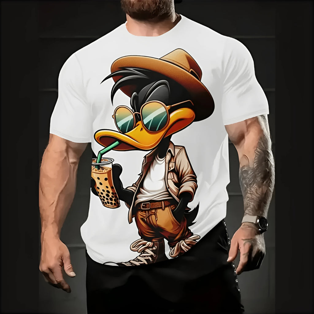 Man wearing a loose-fit grey t-shirt with a raised 3D cartoon print on the front.