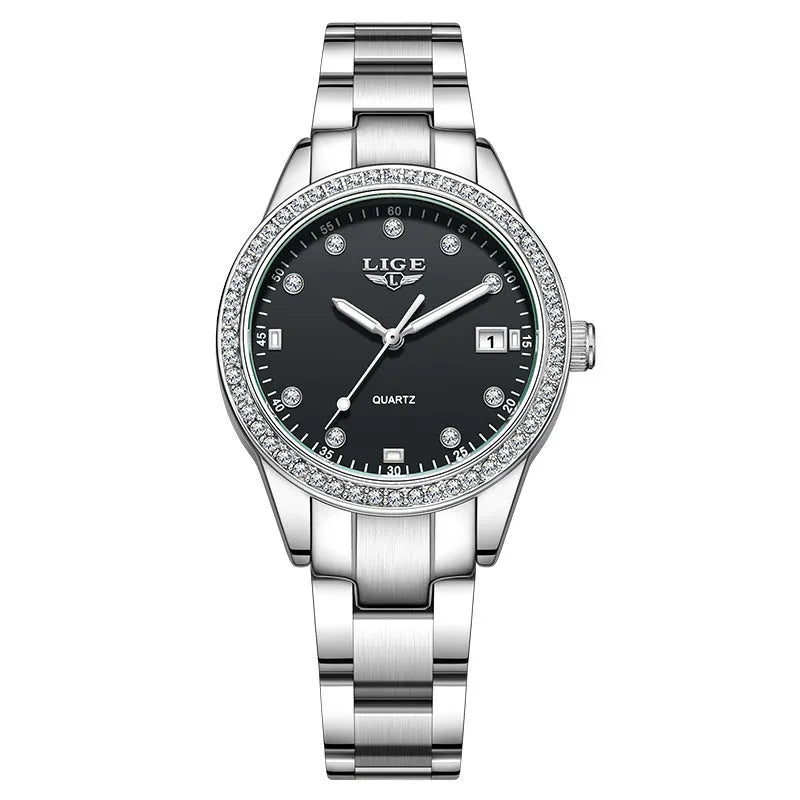 Silver stainless steel fashion watch with diamond markers and luminous hands on a round 34mm dial.