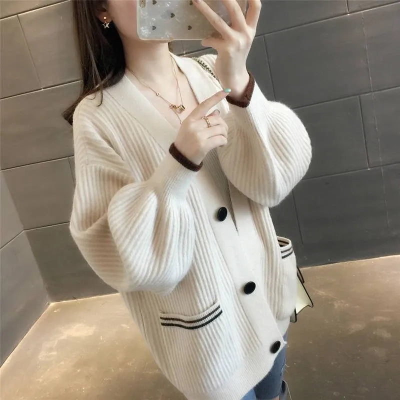 Sleeveless knitted coat in beige, lake blue, pink or yellow with button front, sizes S to 3XL