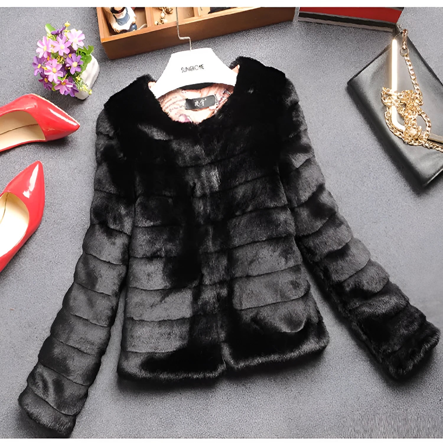 Women's short faux fur top in beige with regular sleeves, shown for street fashion layering.