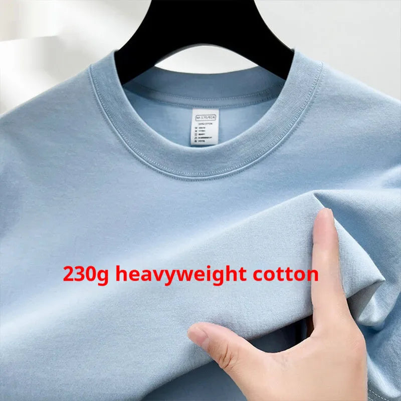 Men's solid colour cotton t-shirt with drop shoulder design on a hanger.