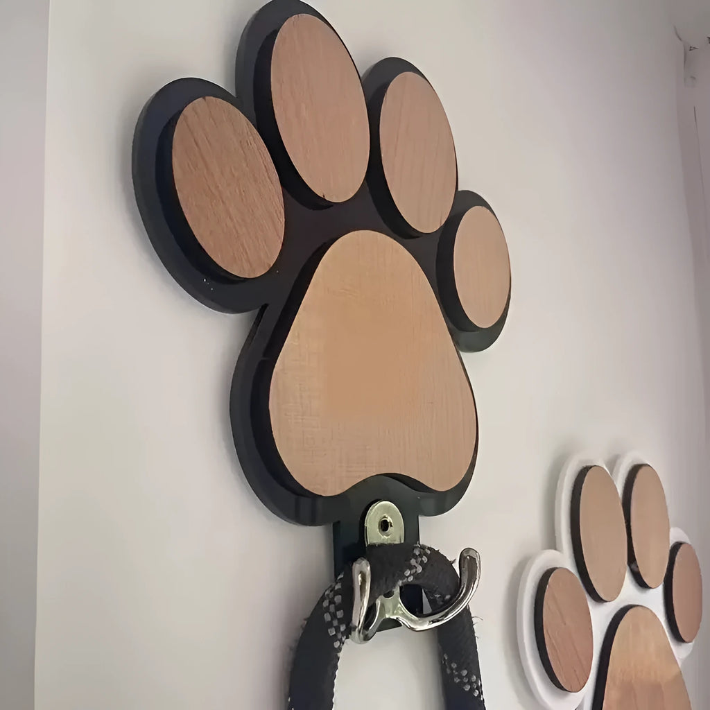 Wooden paw print coat hook in black colour with wall mounting hardware