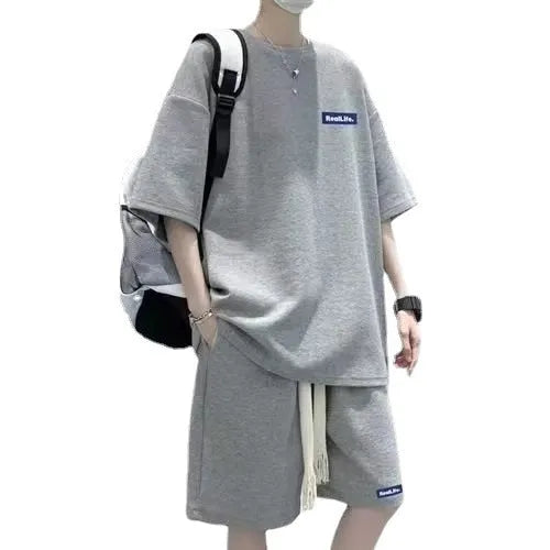 Waffle textured leisure sports suit with short sleeves and matching shorts in cotton-polyester fabric