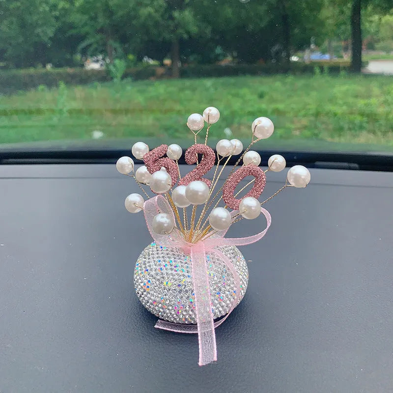 Clay star car decoration ornament for centre console in various red, pink, and pearl white colour designs.