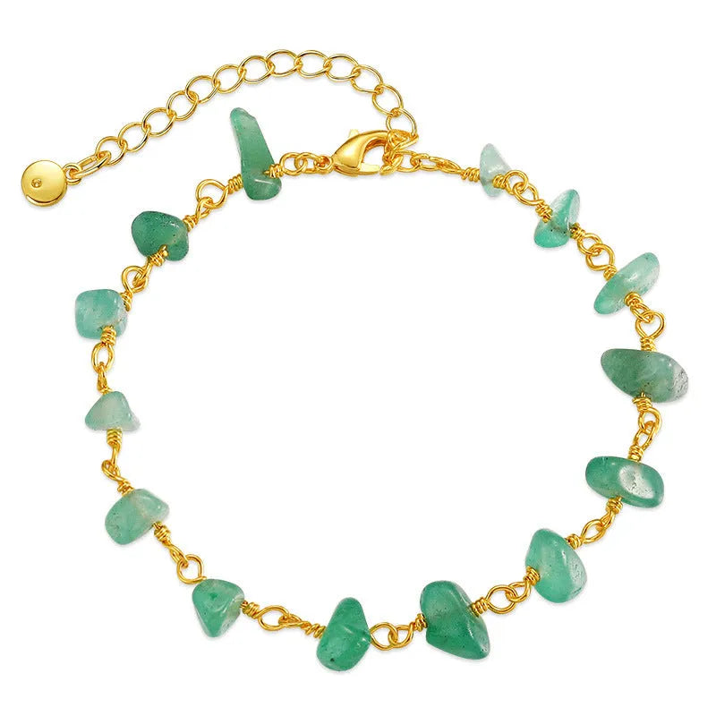 Women's bracelet with irregular gravel turquoise stones and geometric crystals in 18K gold plated copper