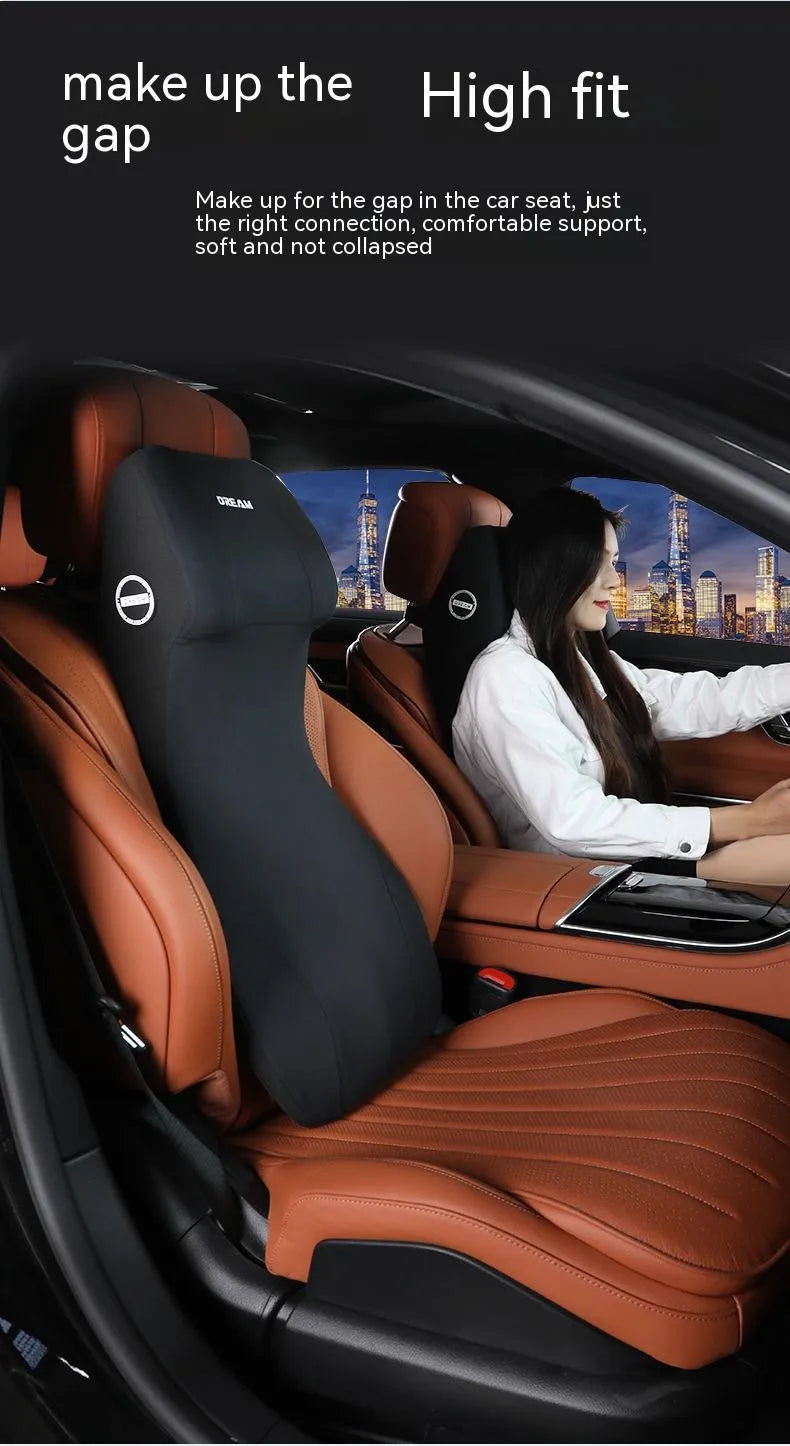 Black automotive memory foam waist cushion and headrest pillow set on a car seat.