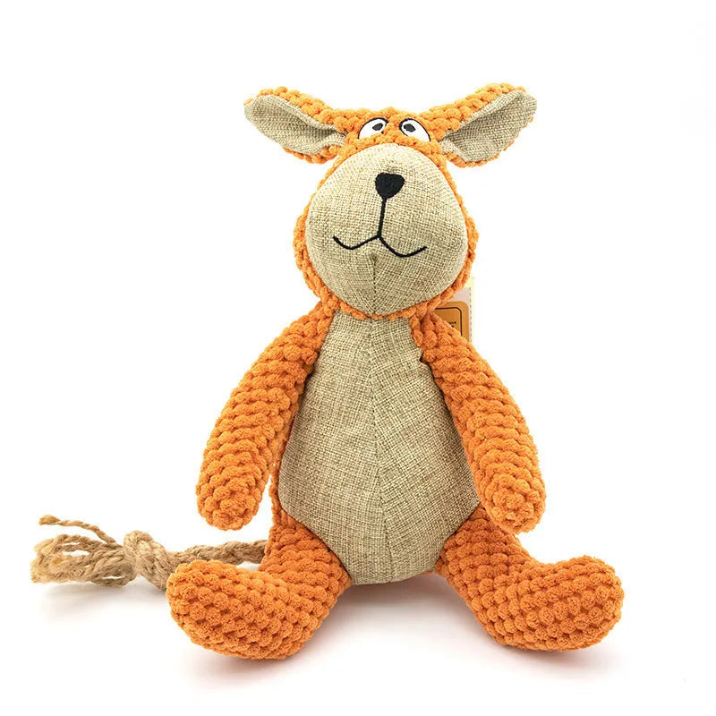 Small plush dog chew toy in animal shape with squeaker for interactive play and teeth cleaning