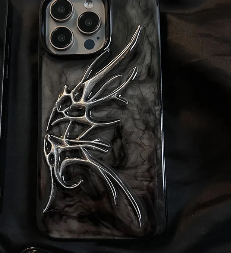 Black iPhone case with a blurred, three-dimensional wings design on the back.