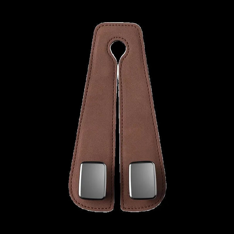Alloy car seat hook storage bag in black suede fabric shown flipped open and closed on car headrest