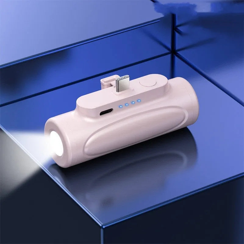 Creative Glare Power Bank with LED flashlight, shown in black and pink, displaying its compact size and charging ports.