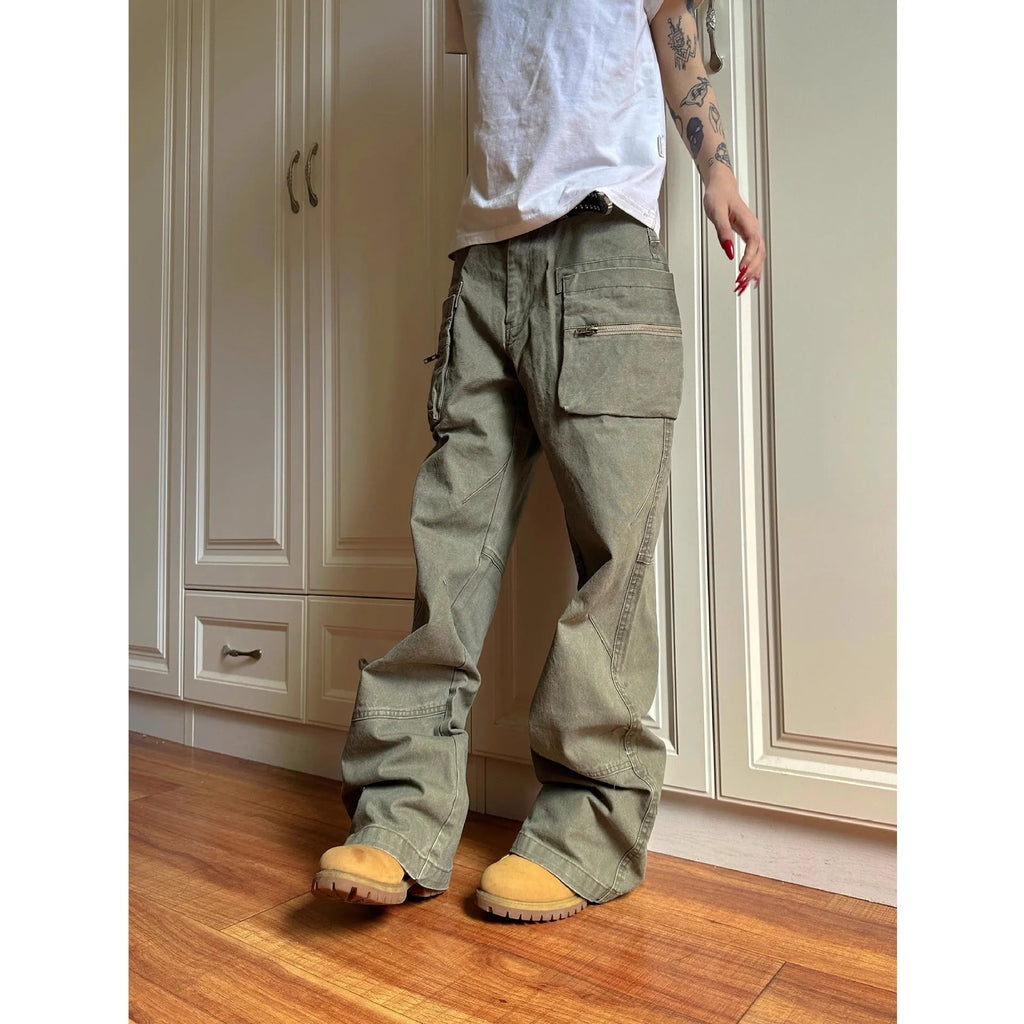 Green double zipper cotton workwear casual pants with a pocket, shown in mid-waist overalls style.