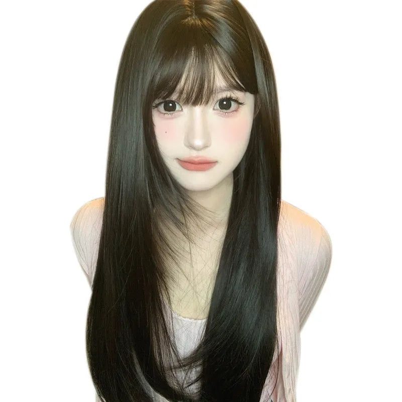 Dark brown long straight synthetic wig with bangs on a wig stand