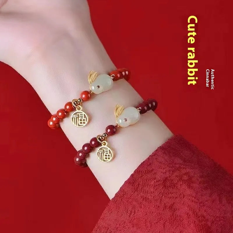 Purple gold sand cinnabar bracelet with jade hare charm, shown with 6mm and 8mm bead size options.