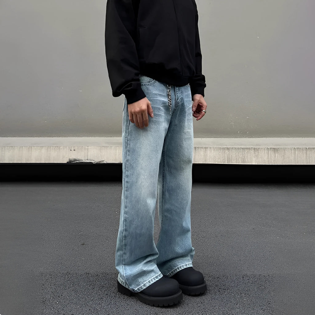 Men's blue straight jeans with whisker washing on thighs and flared leg design