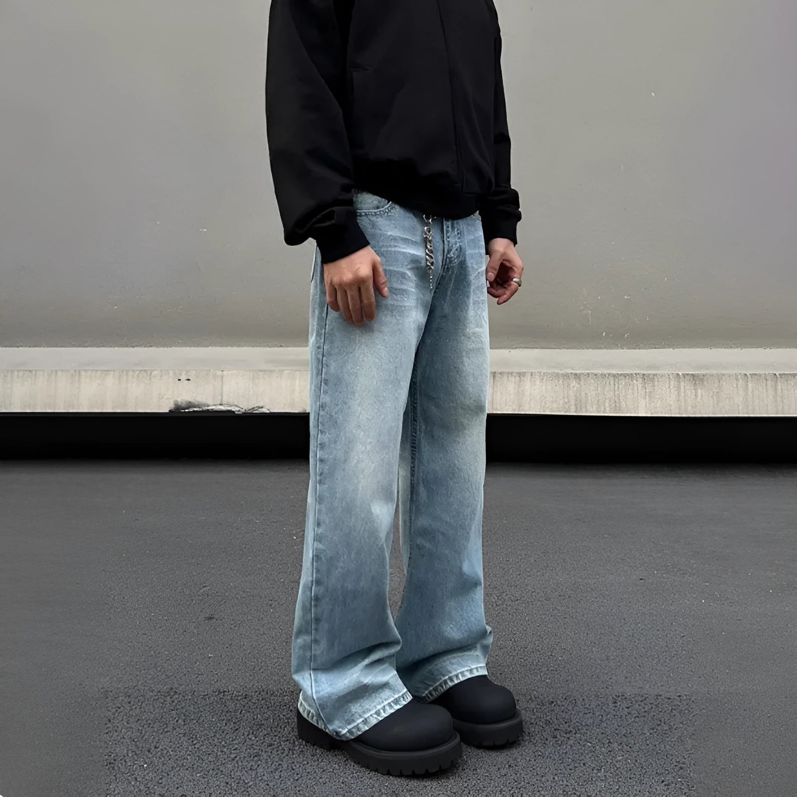 Men's blue straight jeans with whisker washing on thighs and flared leg design