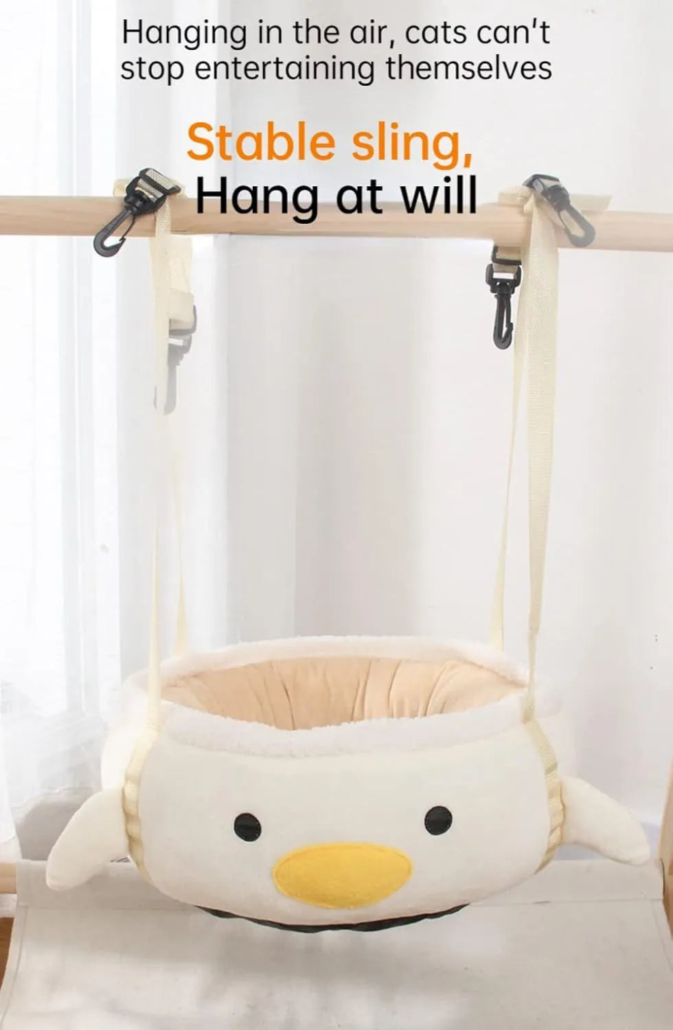 Green dinosaur and chick shaped cat bed shown both flat and hanging as a hammock.
