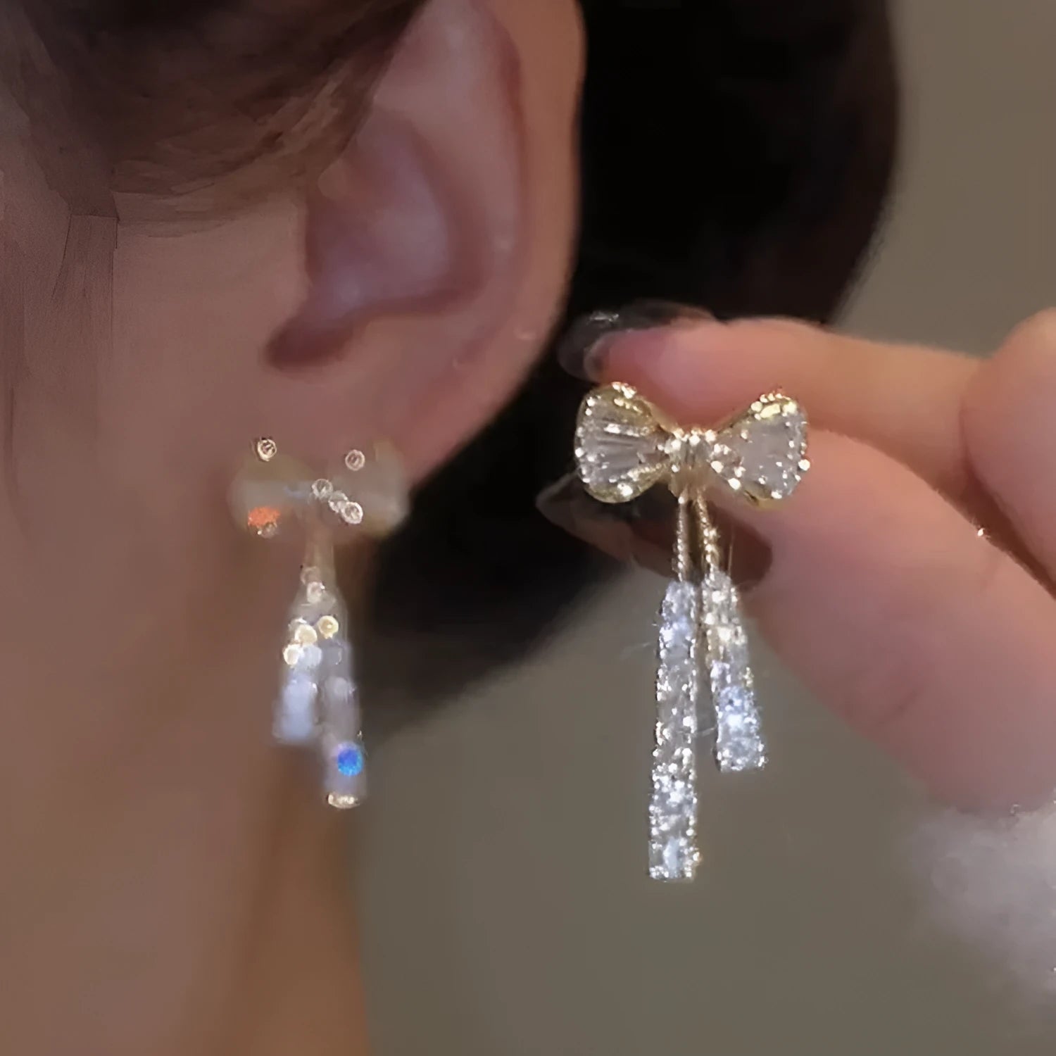 Gold alloy butterfly earrings with rhinestone accents and bow design for women