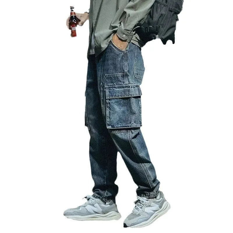 Men's loose straight blue denim trousers with stretch fabric and zip fly in retro style