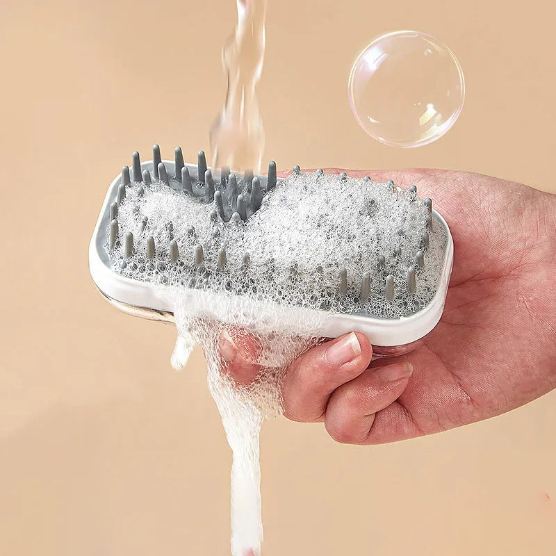 Grey silicone pet bath brush with square scrub pad and curved handle for dogs and cats